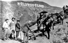 Publicity photo for the Hollywoodland groundbreaking, complete with plow, mules and surveyors. From the book, 'The Hollywood Sign' by Leo Braudy. Published by Yale University Press. Courtesy of the Bruce Torrence Collection/Hollywood Sign Trust